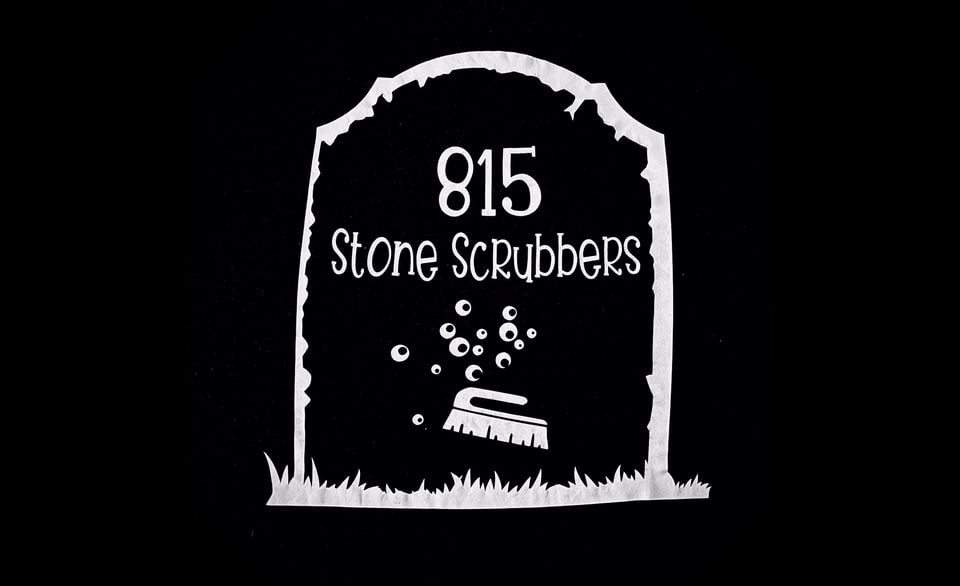 815 Stone Scrubbers logo is seen with a headstone and scrub brush.